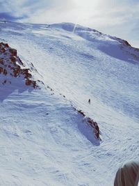 People on snow covered landscape