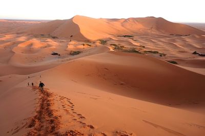 Scenic view of desert against sky