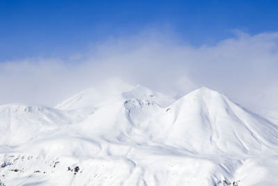 Snowy mountains landscape in gudauri, georgia. sunny day.