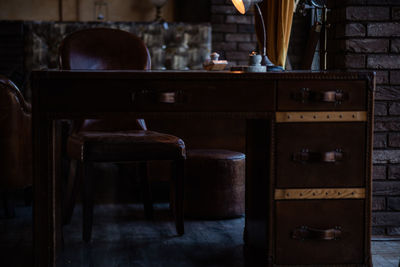 Empty chairs and table in cafe