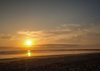Scenic view of sunset over sea