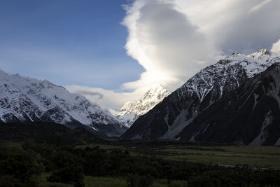 Scenic view of snowcapped mountains against sky