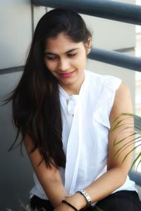 Portrait of a smiling young woman