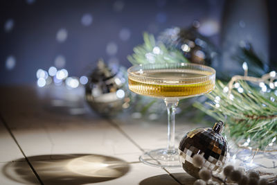 Close-up of champagne flute on table