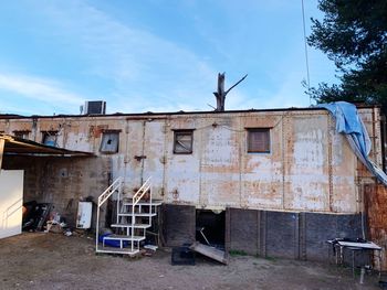 Abandoned building against sky