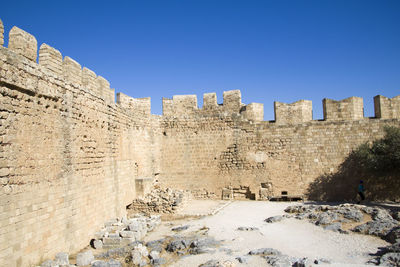 Old ruins against clear blue sky