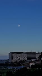 View of built structures against clear sky