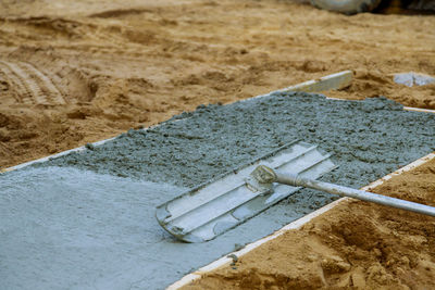 High angle view of construction site on sand