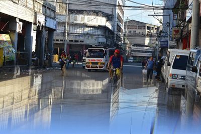 Panoramic view of cars in city