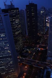 Illuminated cityscape at night