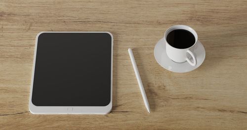 High angle view of coffee cup on table