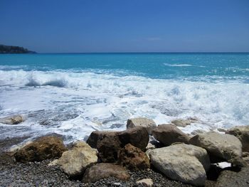 Scenic view of sea against clear sky