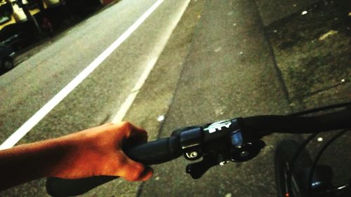 Woman riding bicycle on street