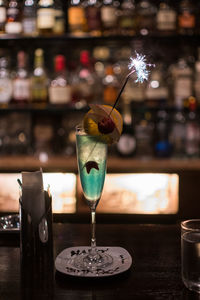 Close-up of beer glass on table