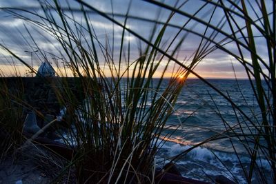 Scenic view of sea against sky during sunset