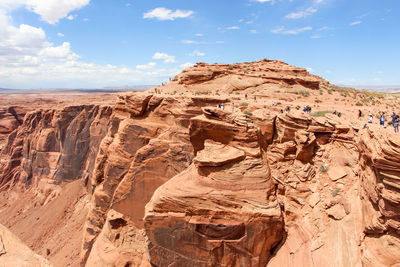 Rock formations in desert against sky