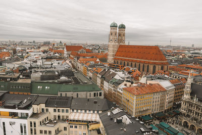 High angle view of buildings in city against sky