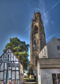 Low angle view of building against sky in city