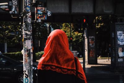 Rear view of man on street in city