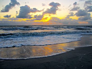 Scenic view of sea at sunset