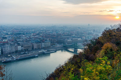High angle view of river amidst buildings in city