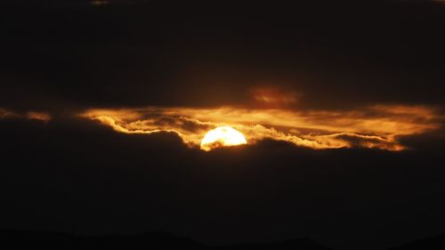 Low angle view of dramatic sky at sunset