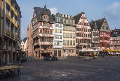 Buildings in city against sky