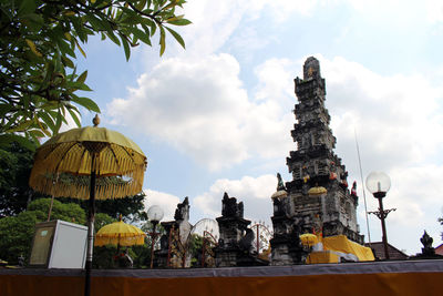 Low angle view of statue against sky