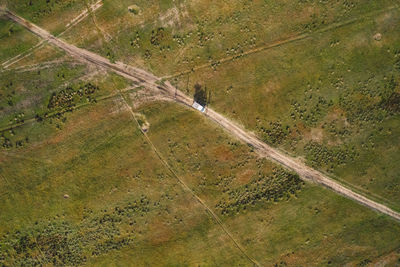 High angle view of road on field