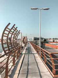 View of pier on street against clear sky