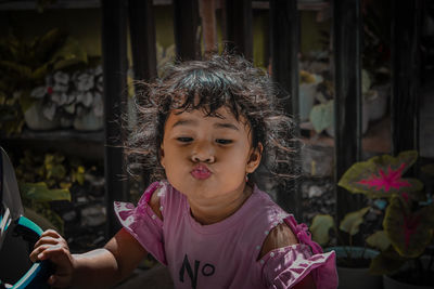 Portrait of cute girl looking away