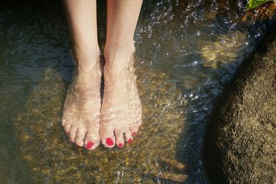 Low section of person in water