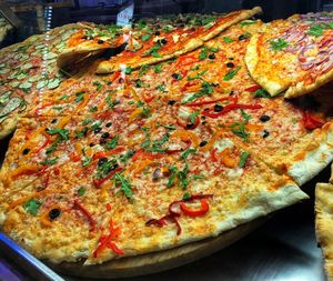 Close-up of pizza served on table