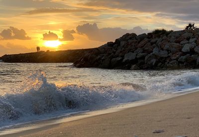 Scenic view of sea against sky during sunset