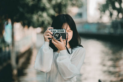 Portrait of man photographing