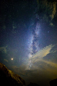 Low angle view of star field against sky at night