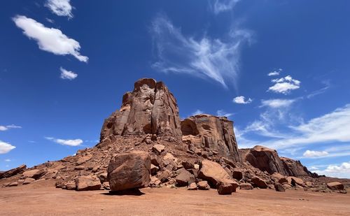 Rock formations on mountain against sky