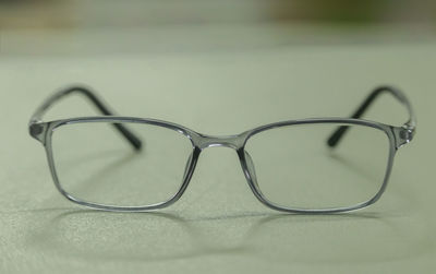 Close-up of eyeglasses on table