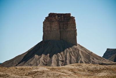 Low angle view of fort against clear blue sky