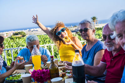 Group of people having lunch in restaurant