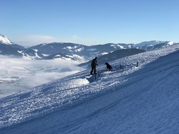 Scenic view of snowcapped mountain against sky