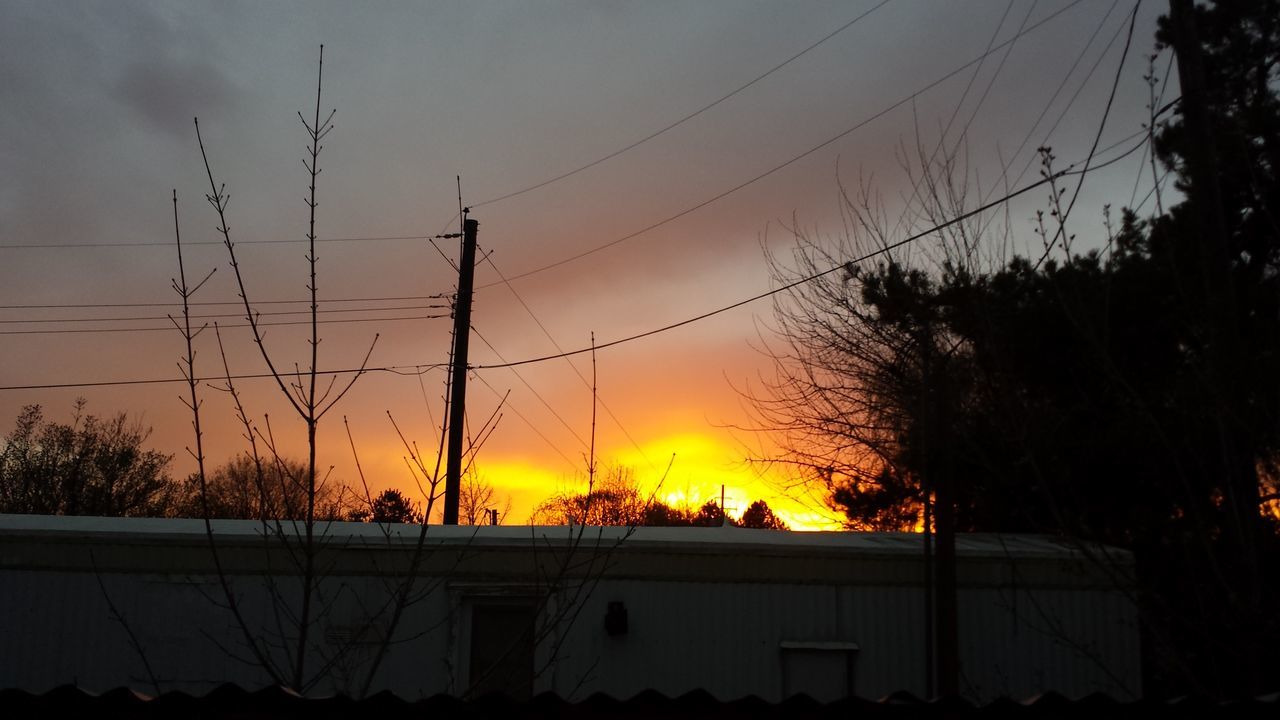 sunset, silhouette, orange color, power line, electricity pylon, sun, sky, electricity, connection, power supply, beauty in nature, scenics, nature, cable, fuel and power generation, built structure, tree, tranquility, no people, outdoors