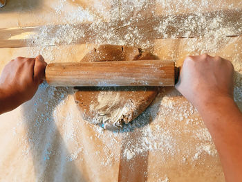 Midsection of person preparing food