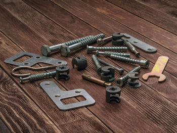 High angle view of equipment on wooden table