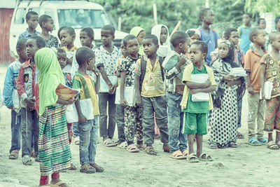 Group of people standing outdoors