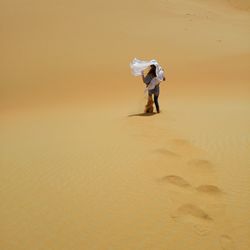 Full length of woman in desert