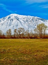 Scenic view of snowcapped mountains against sky
