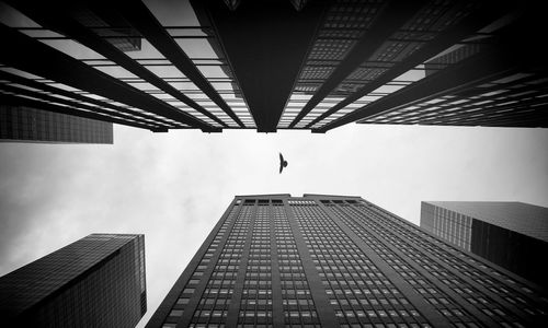 Low angle view of skyscrapers against sky