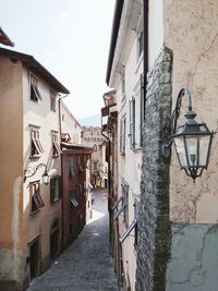 Street amidst buildings against sky