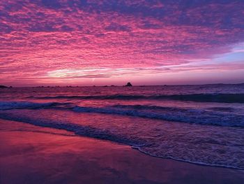 Scenic view of sea against sky at sunset